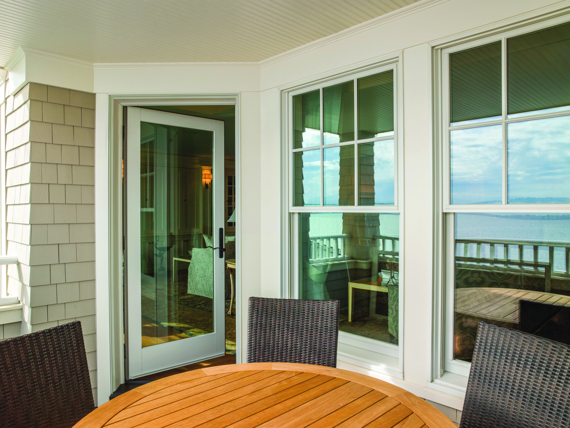 White up and down windows and a full glass patio door on a patio in Apex, NC
