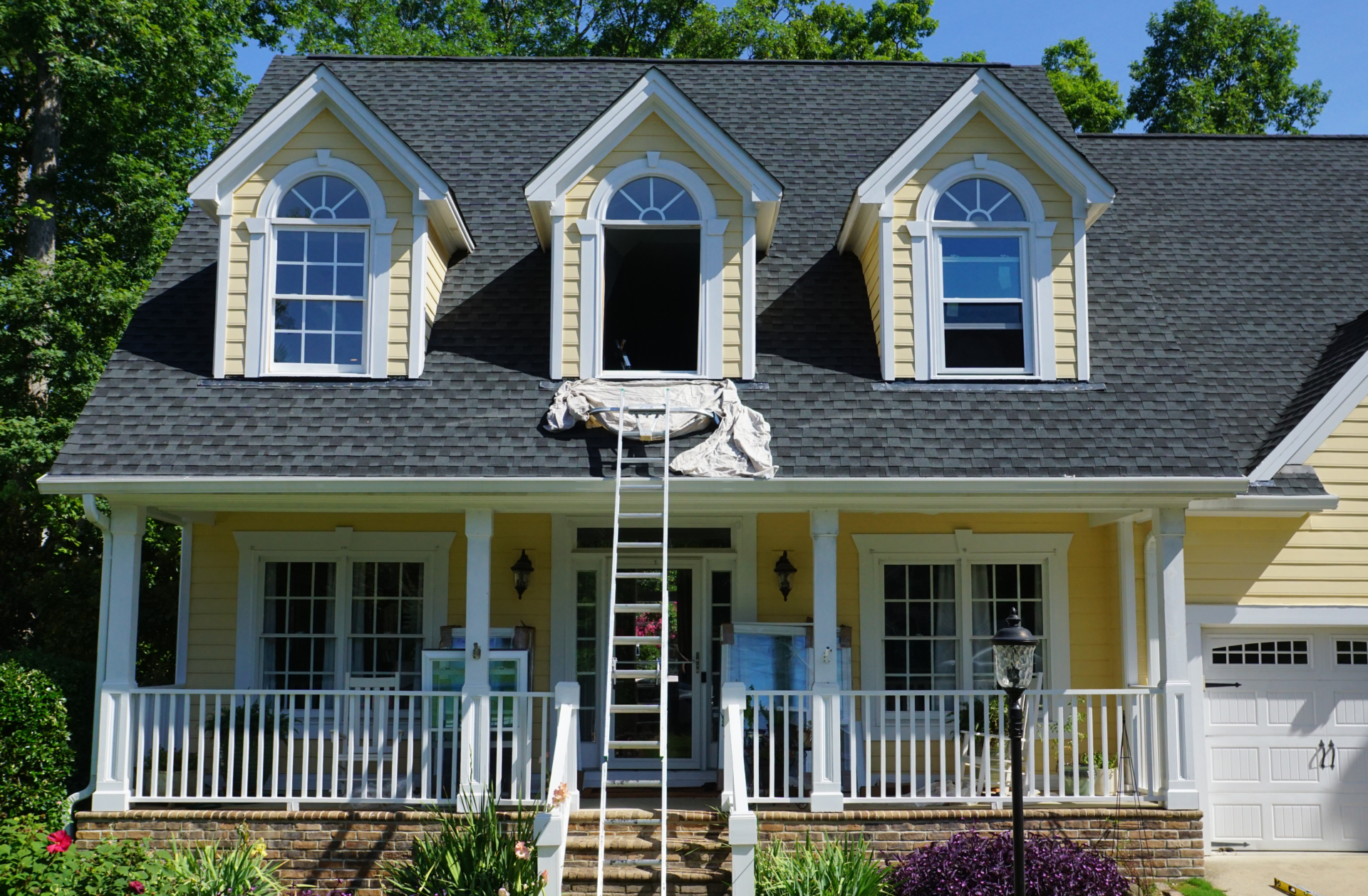 traditional yellow home with up down windows