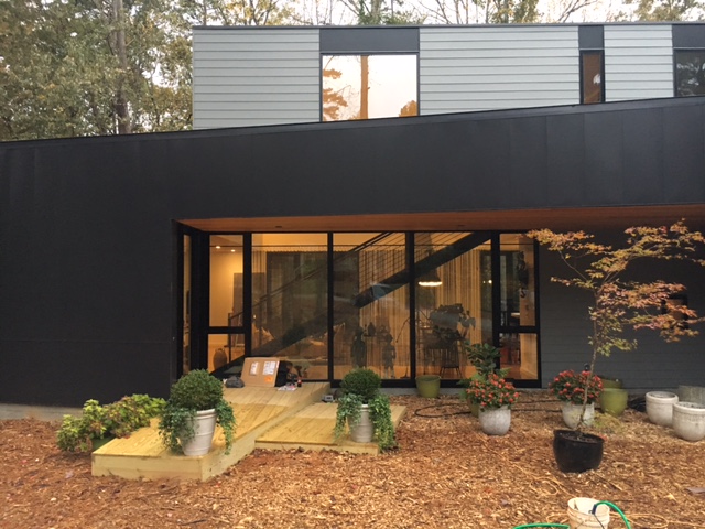 modern minimal architechture home with potted garden and black Andersen E series windows