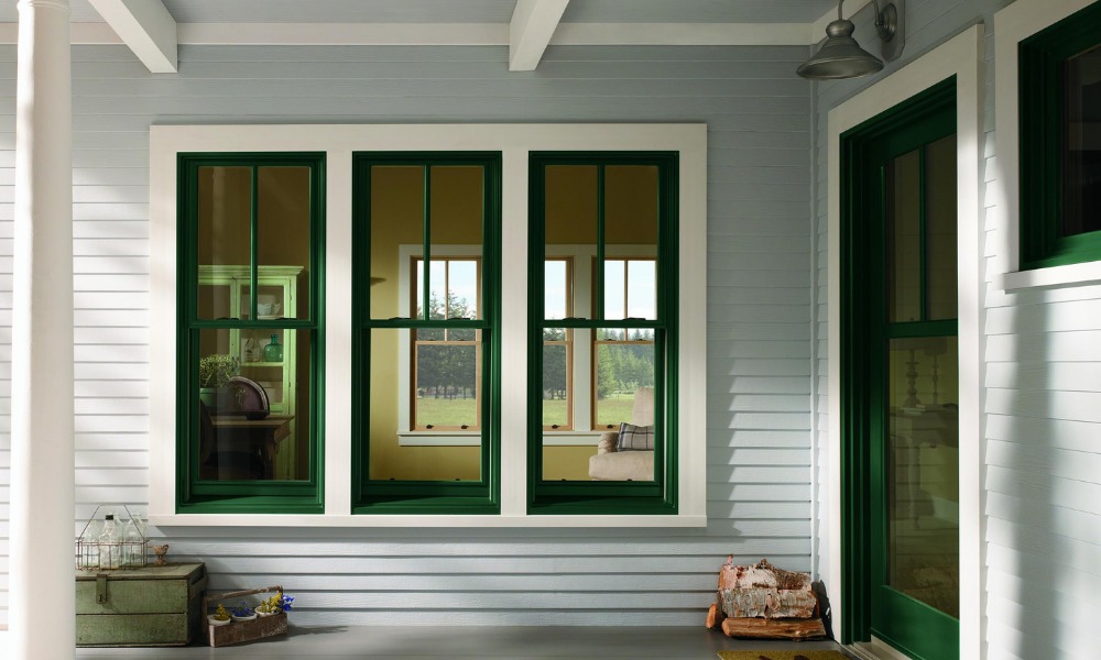Home in Chapel Hill, NC with three green windows by front door porch