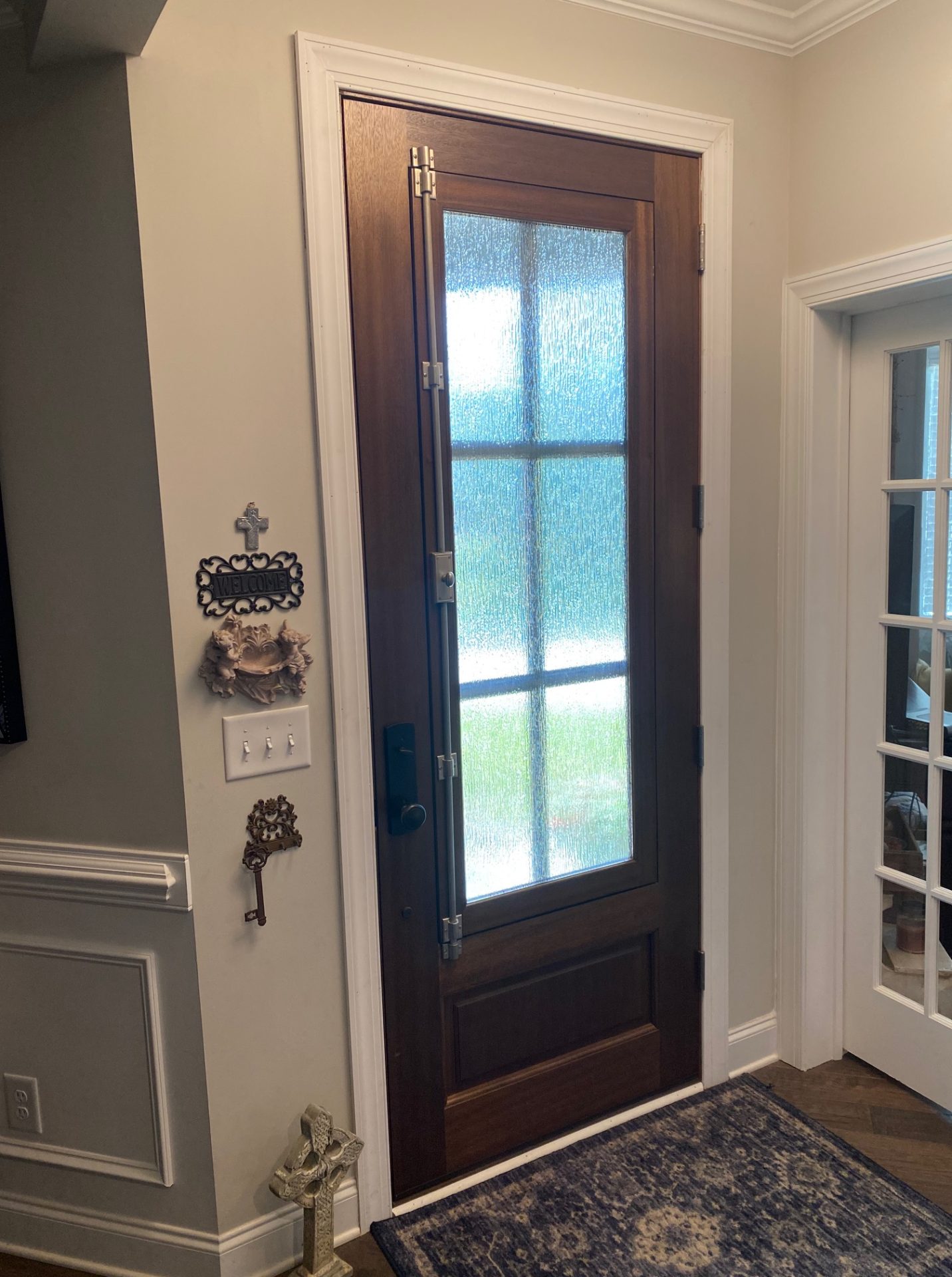 The DSA Breezeport door seen from inside a home, with the venting window closed.