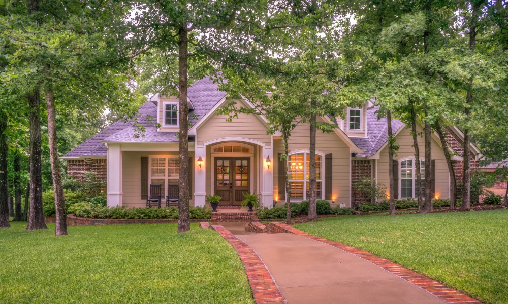 traditional home on a wooded lot with double hung windows