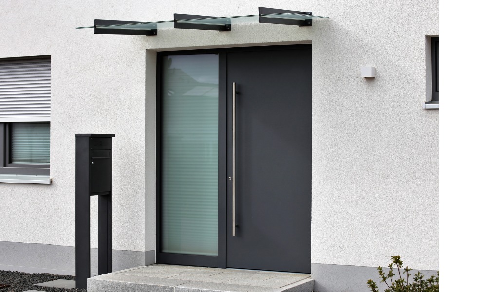 black front door featuring one large sidelight