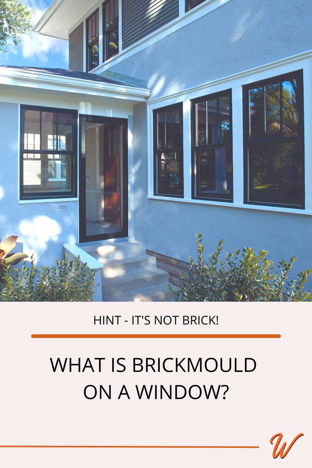 blue stucco home with black windows and white brickmould captioned with 'What is brickmould on a window? Hint - it's not brick!"