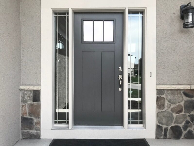 black quarter light door with sidelights with prairie grille pattern