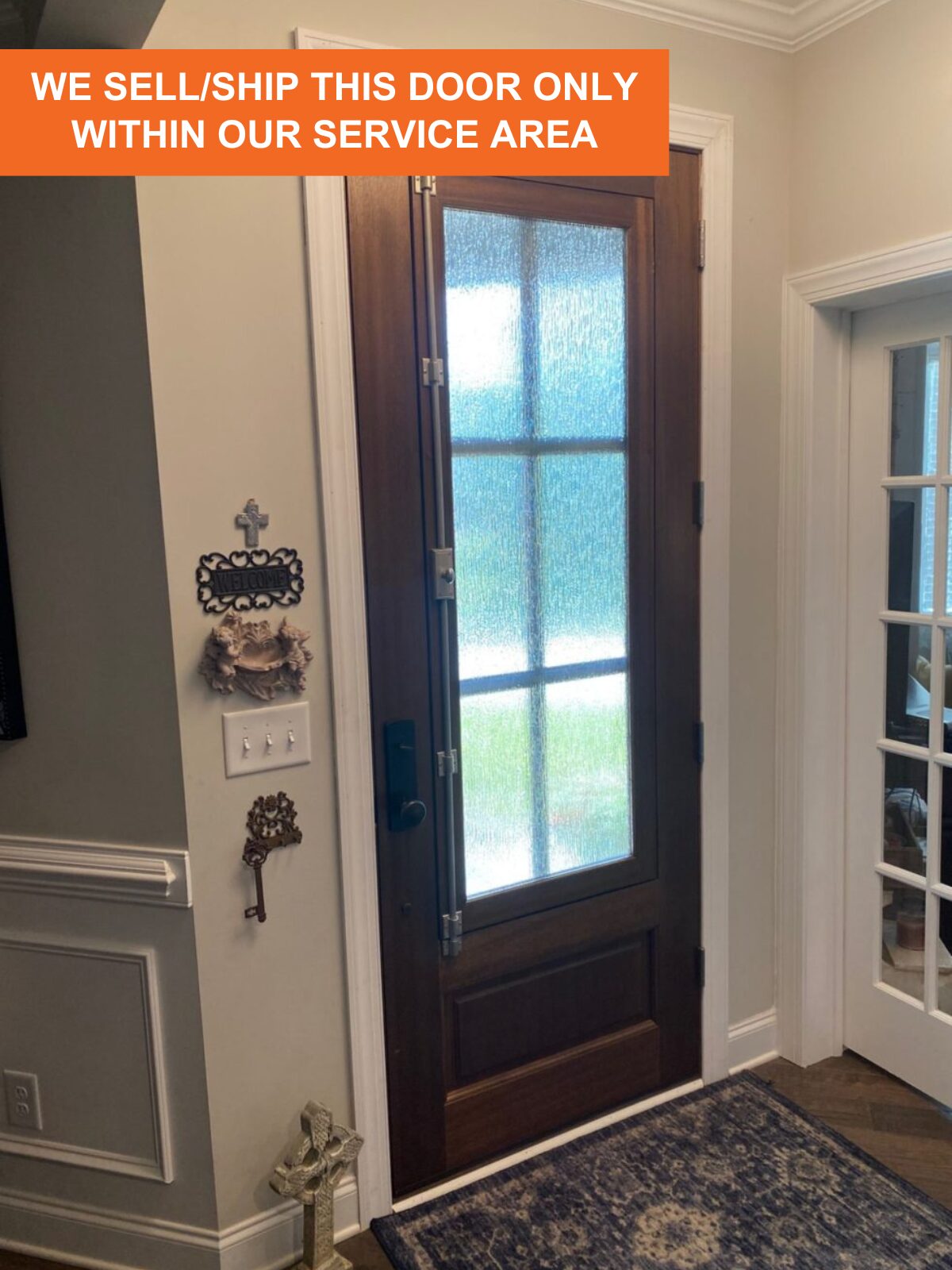 The DSA Breezeport door seen from inside a home, with the venting window closed.