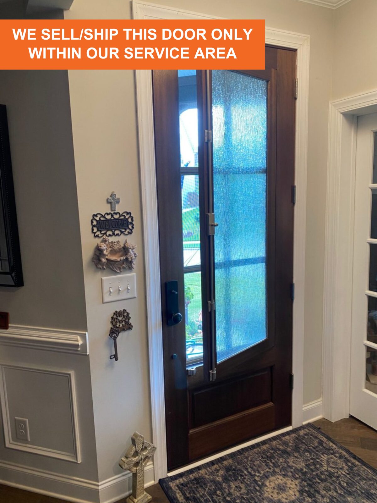 The DSA Breezeport door from inside a home with the venting window partially open. The option for privacy glass gives homeowners security, while opening the venting window lets you open up your home.