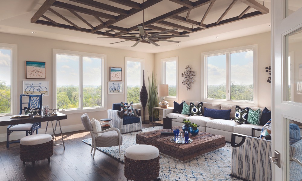 living room with white casement Andersen windows overlooking coastal plain