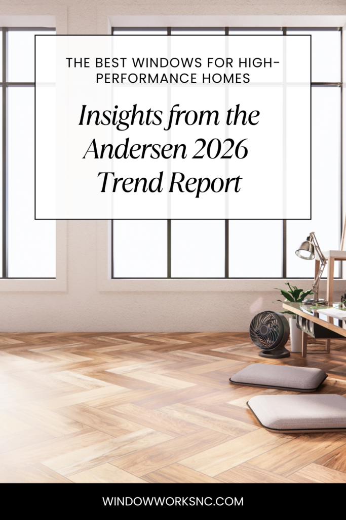 A modern room with large floor-to-ceiling windows—showcasing The Best Windows for High-Performance Homes—wood flooring, a small desk with a chair, and plants. Overlaid text reads: “Insights from the Andersen 2026 Trend Report.”.