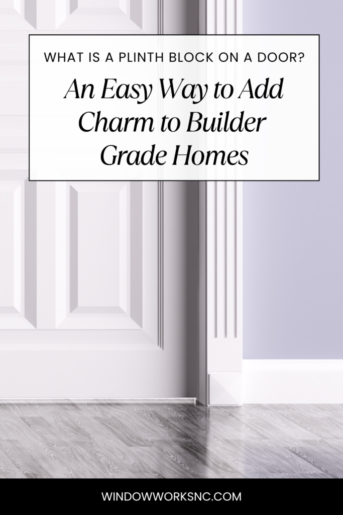 A close-up of a white door with decorative trim and a plinth block at the base. Overlaid text reads: Discover what is a plinth block on a door—an easy way to add charm to builder grade homes. Website: windowworksnc.com.